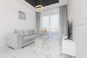 Elegant Apartments with Balcony & Parking Warsaw by Noclegi Renters